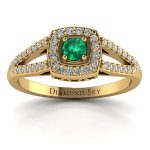 Współczesna elegancja - Pierścionek zaręczynowy z żółtego złota z diamentami i szmaragdem